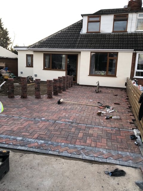 Laying block paving